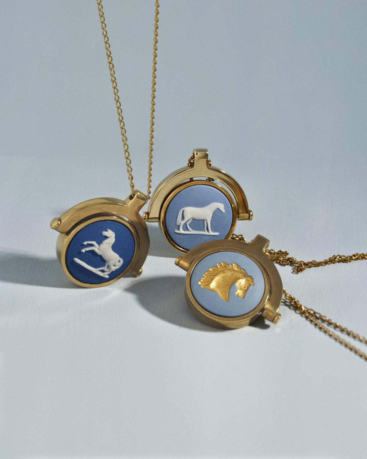 GOLD PLATED VINTAGE CERAMIC HORSE SWIVEL NECKLACES