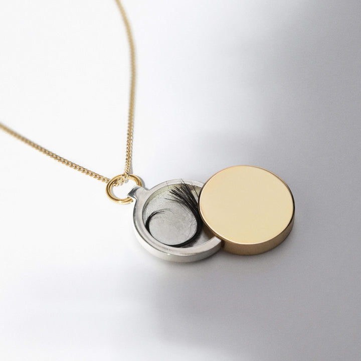 Gs Names Lockets LARGE GOLD AND SILVER ECLIPSE LOCKET NECKLACE – Ferian