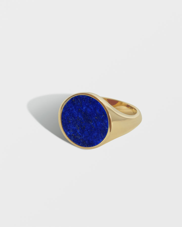 Chunky gold round signet ring set with Lapis 